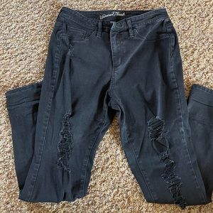 Worn once. Black distressed high rise jeggings.